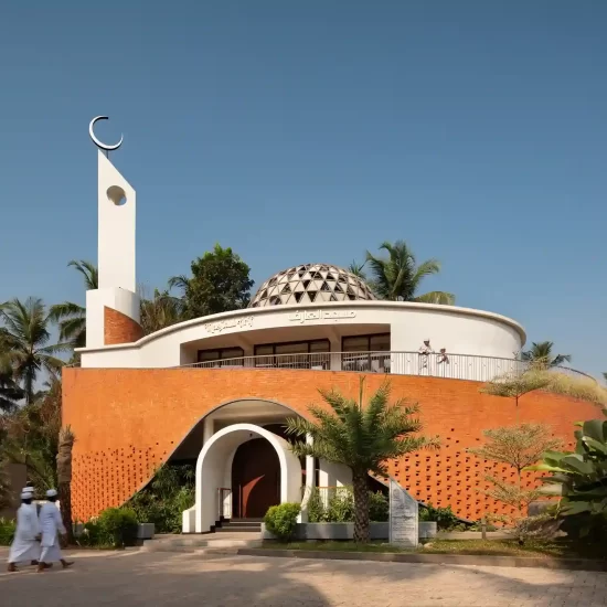 Modern mosque design in Kerala featuring contemporary masjid architecture with dome, minaret, and curved brick facade