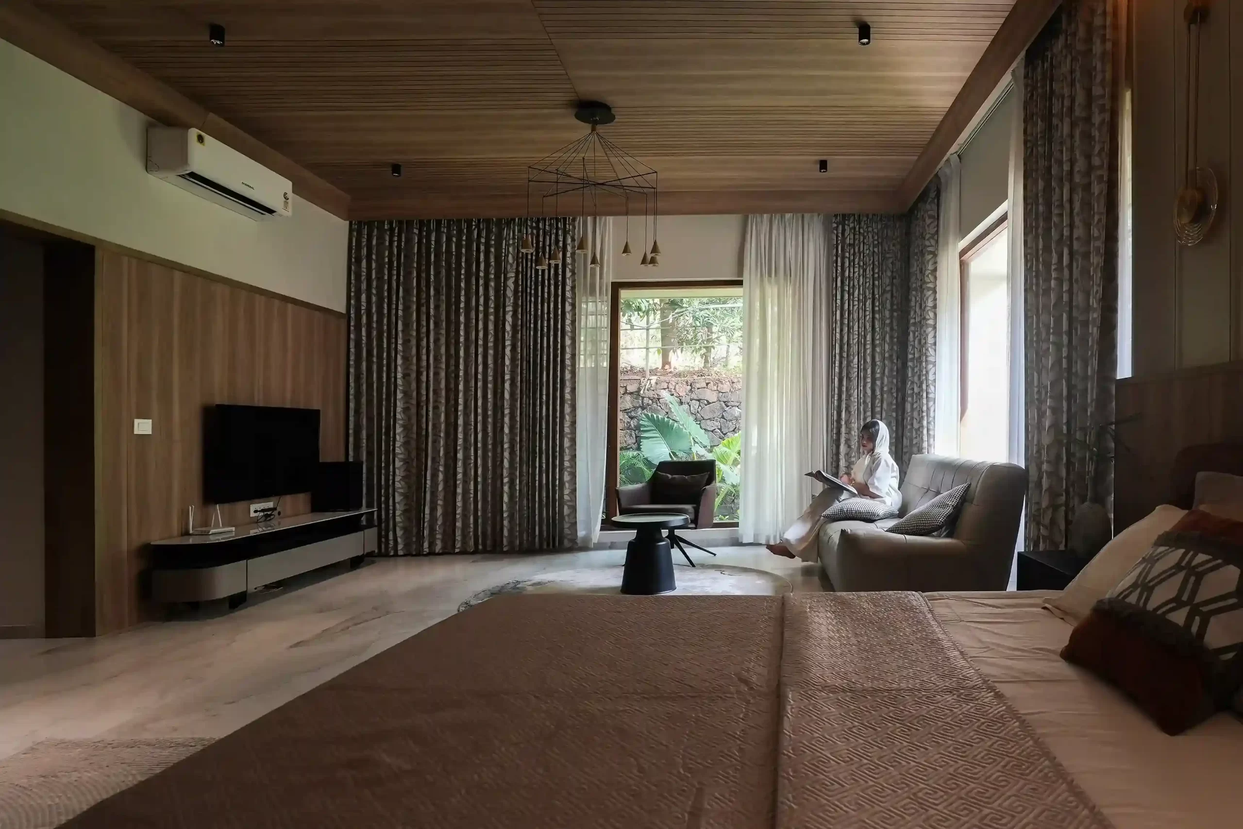 luxury-bedroom-with-garden-view-raaha-mansion