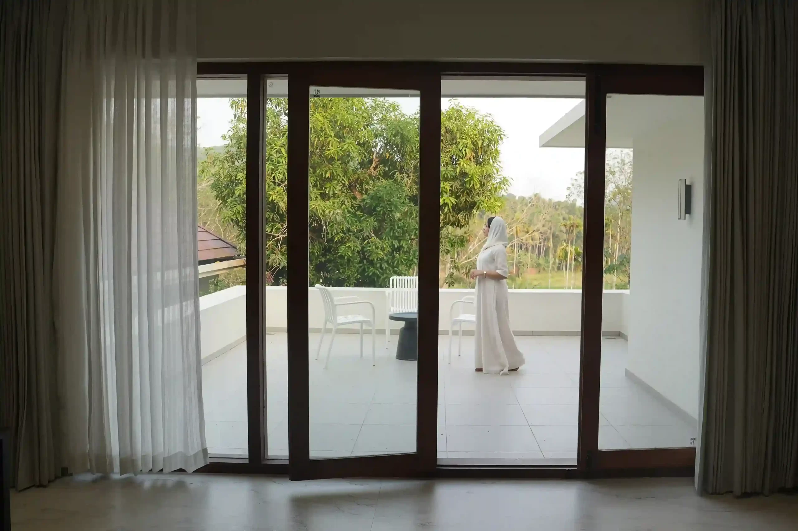 raaha-mansion-open-terrace-luxury-home-renovation-malappuram.