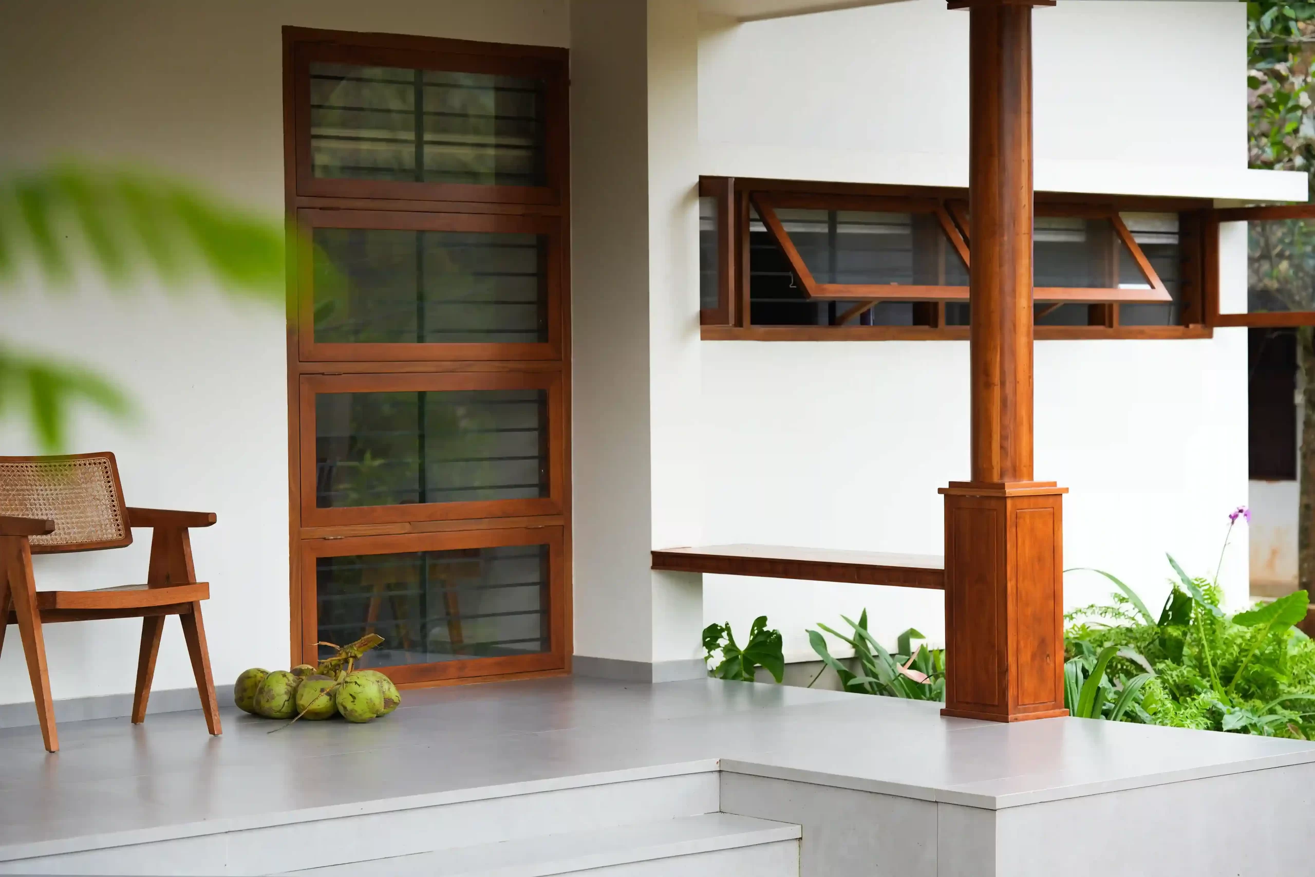 Dhara Kerala house sit-out with wooden columns