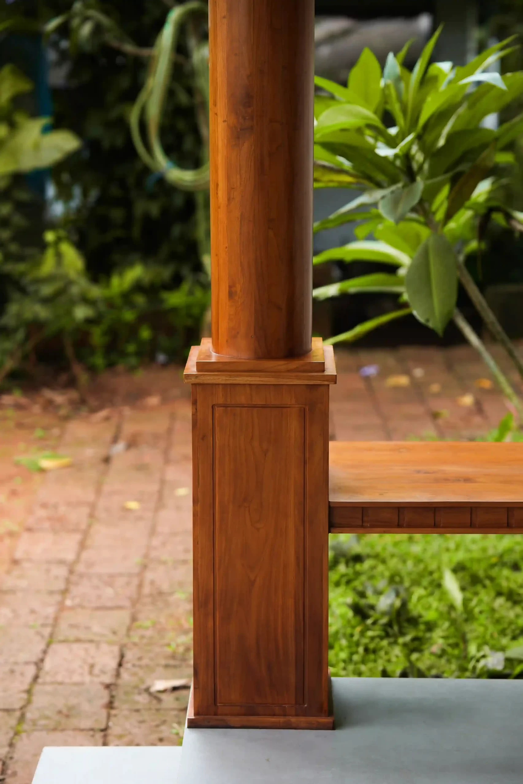Wooden column detail in a traditional Kerala house