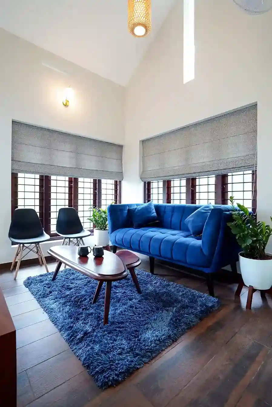Spacious living area by top residential architects combining open flow and soft, earthy textures.