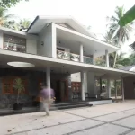 Modern home interior renovation in Calicut featuring sleek finishes and natural lighting