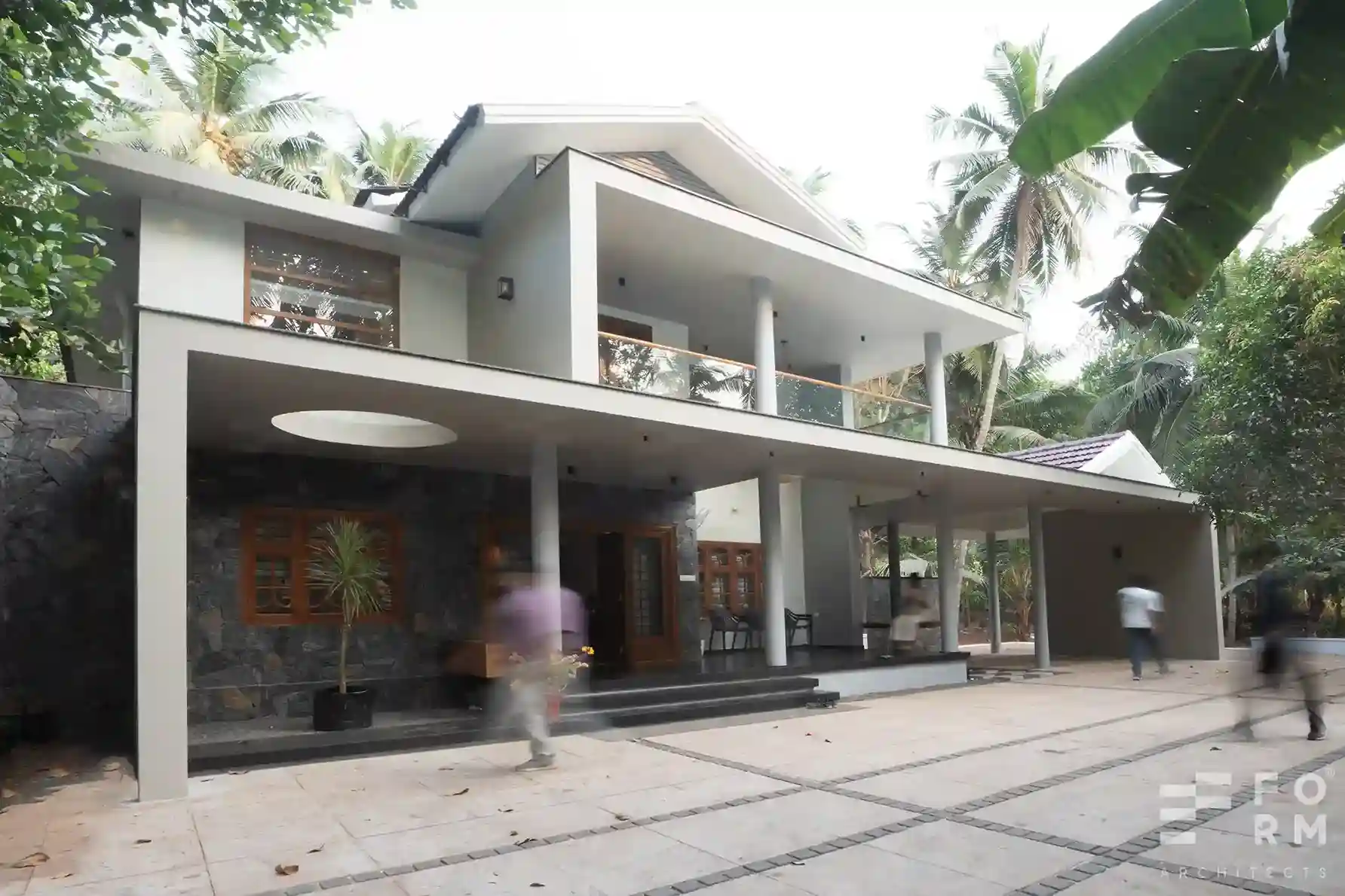 Modern home interior renovation in Calicut featuring sleek finishes and natural lighting