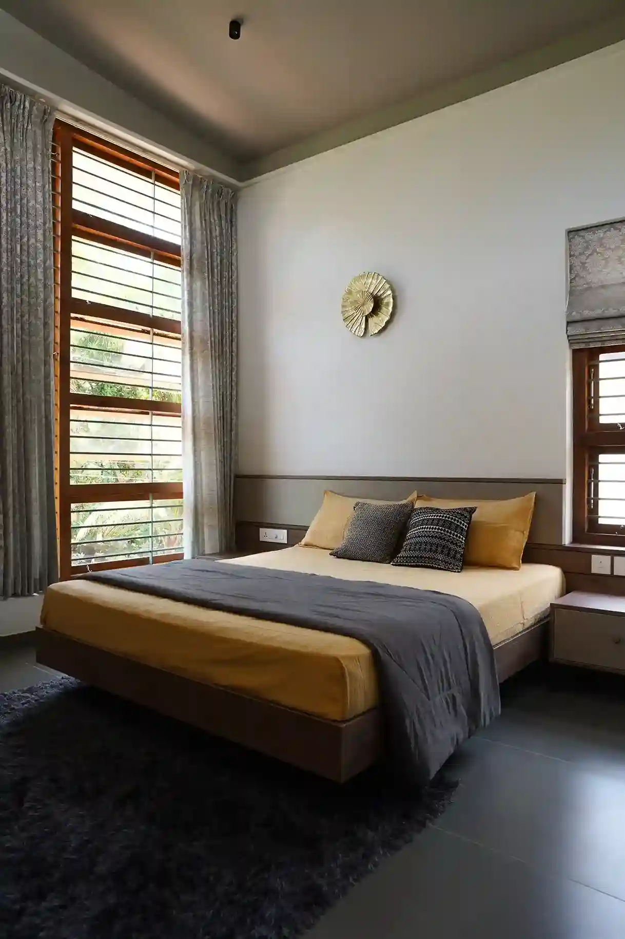 Contemporary house design Kerala elegant bedroom interior