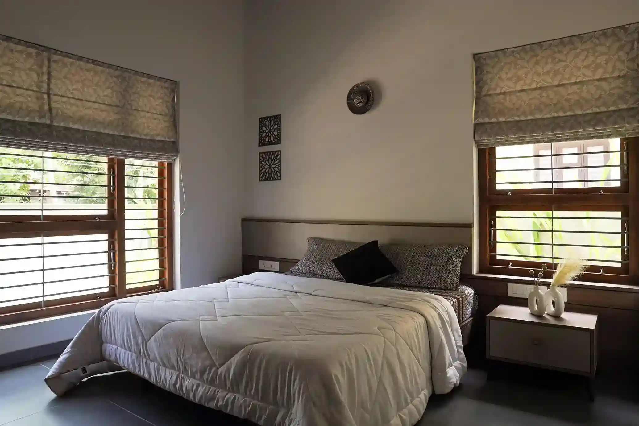 Contemporary house design Kerala cozy bedroom with natural light