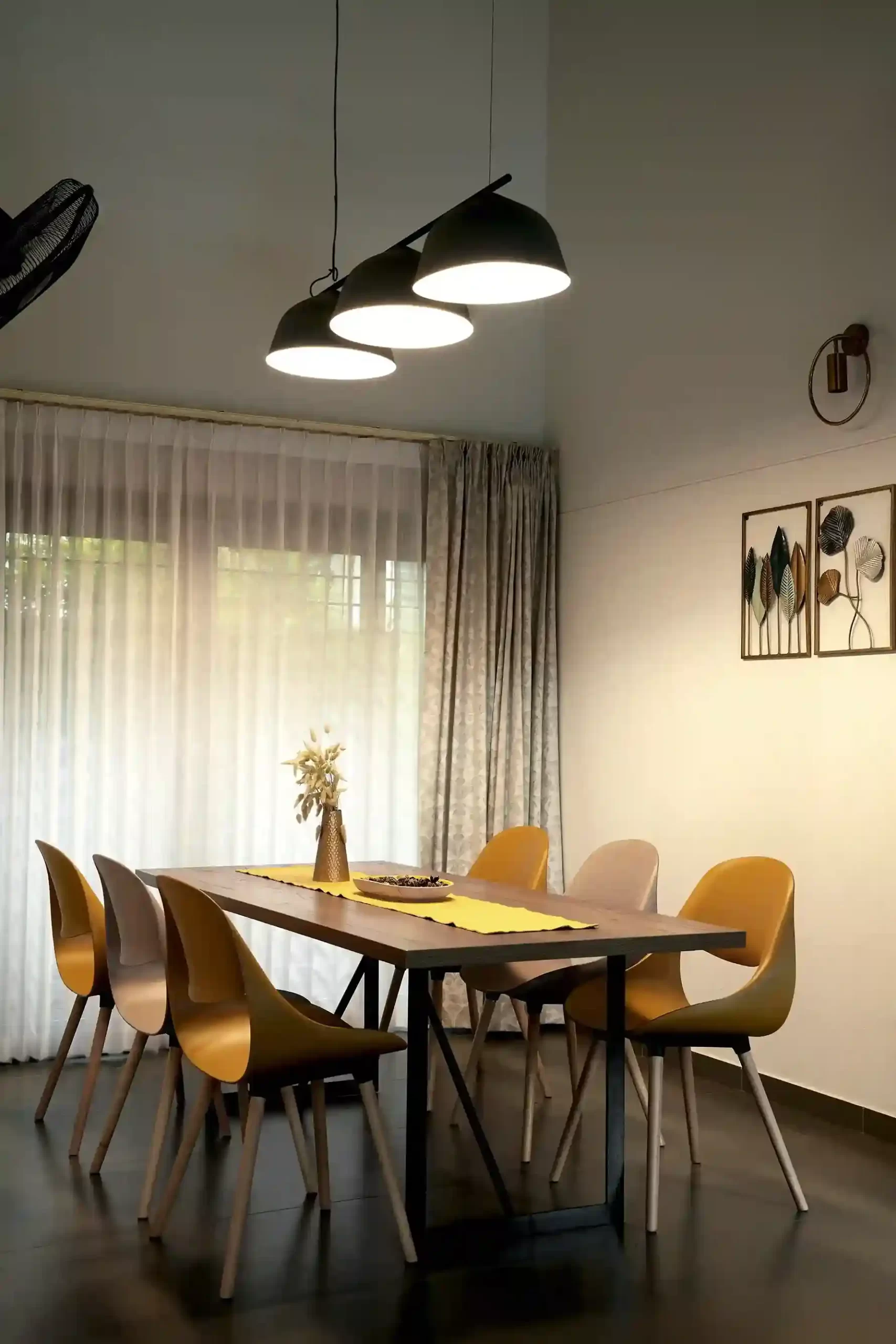 Contemporary house design Kerala dining area with natural light