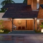 Close-up front view highlighting entry sit-out and wooden door