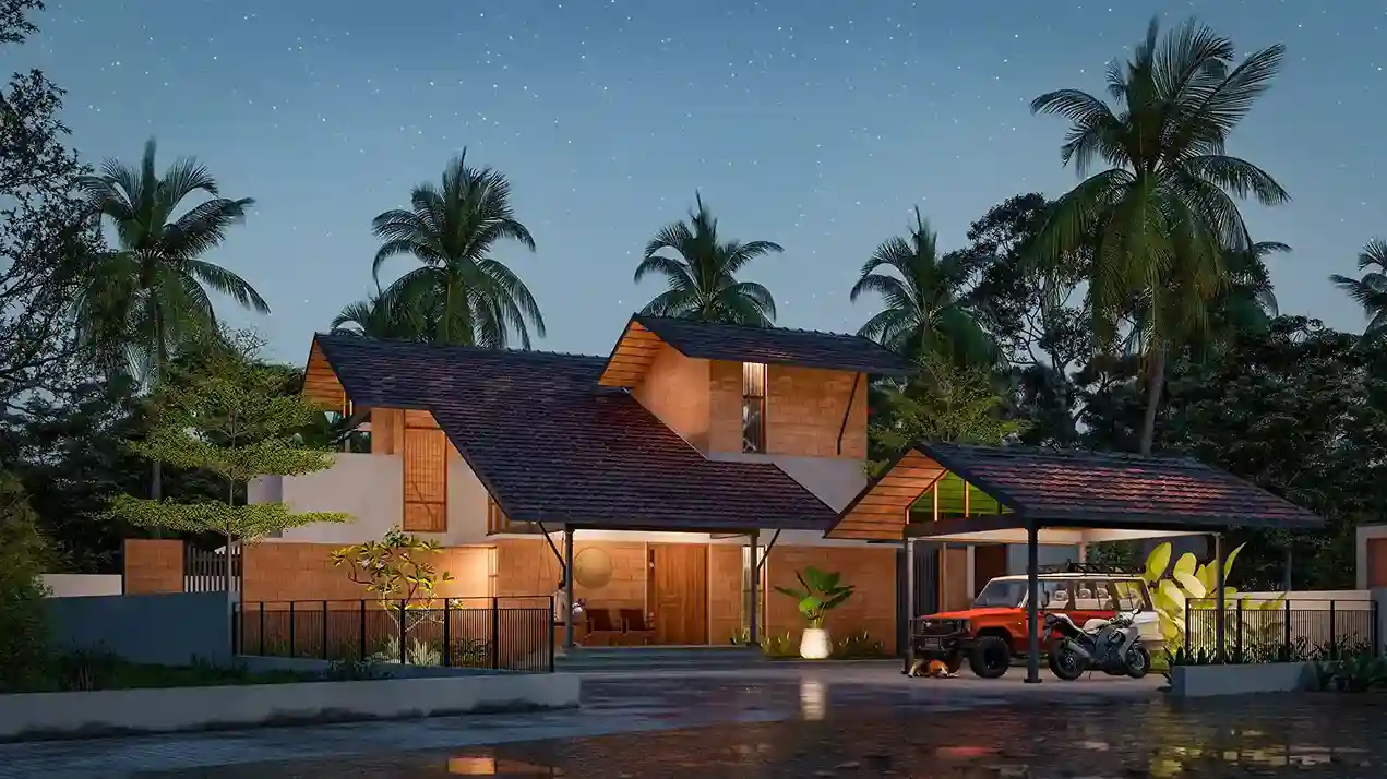 Night view of traditional Kerala home with warm exterior lights