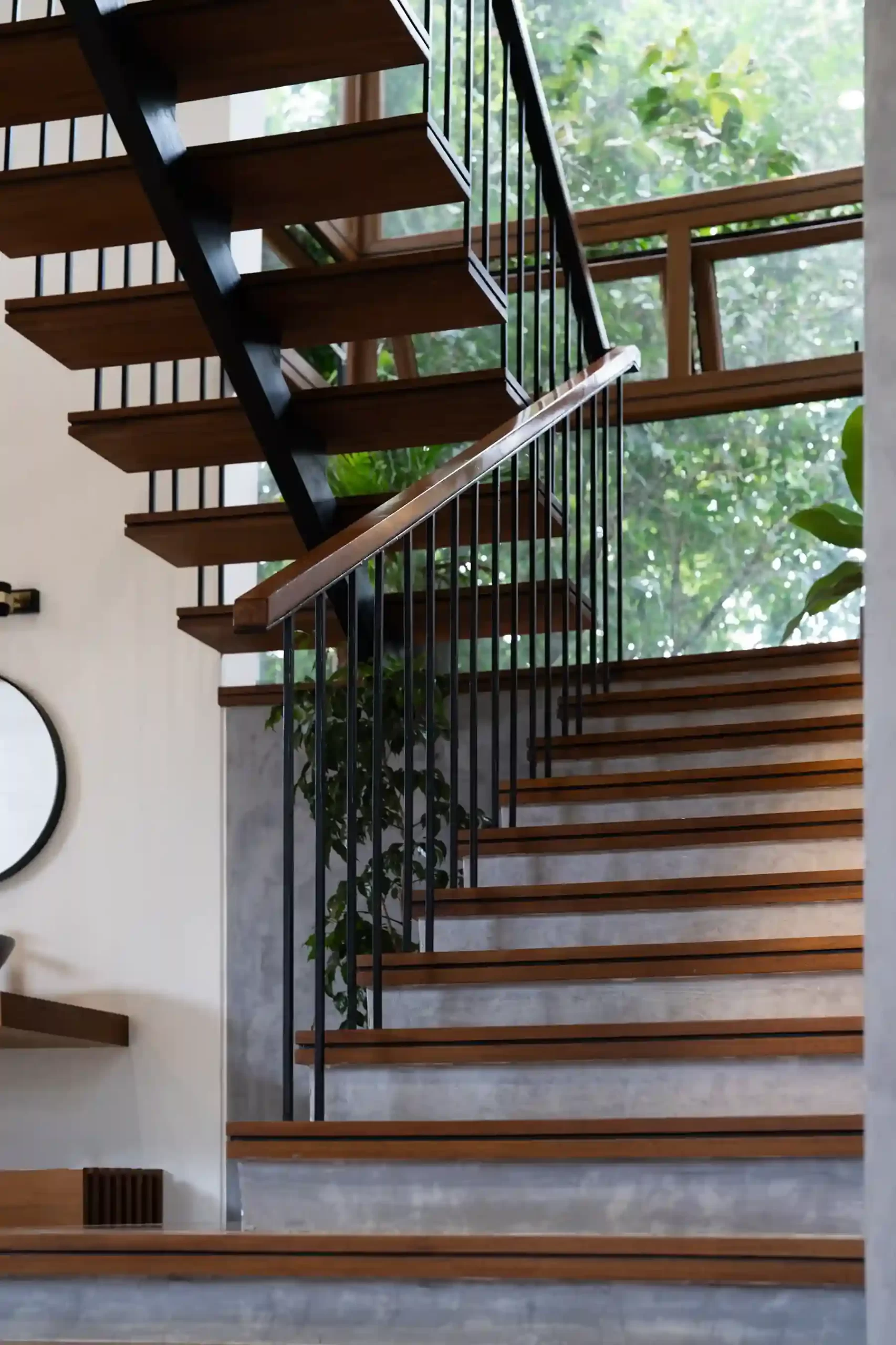 Kymara-residence-amir-vettukad-tropical-stair-wood-concrete