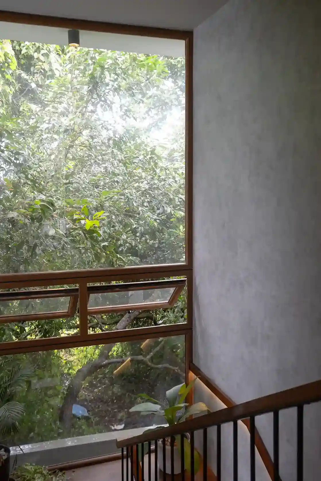 Tropical Modern Kerala, Lush Green, Large Windows, Natural Materials, Pulikkal