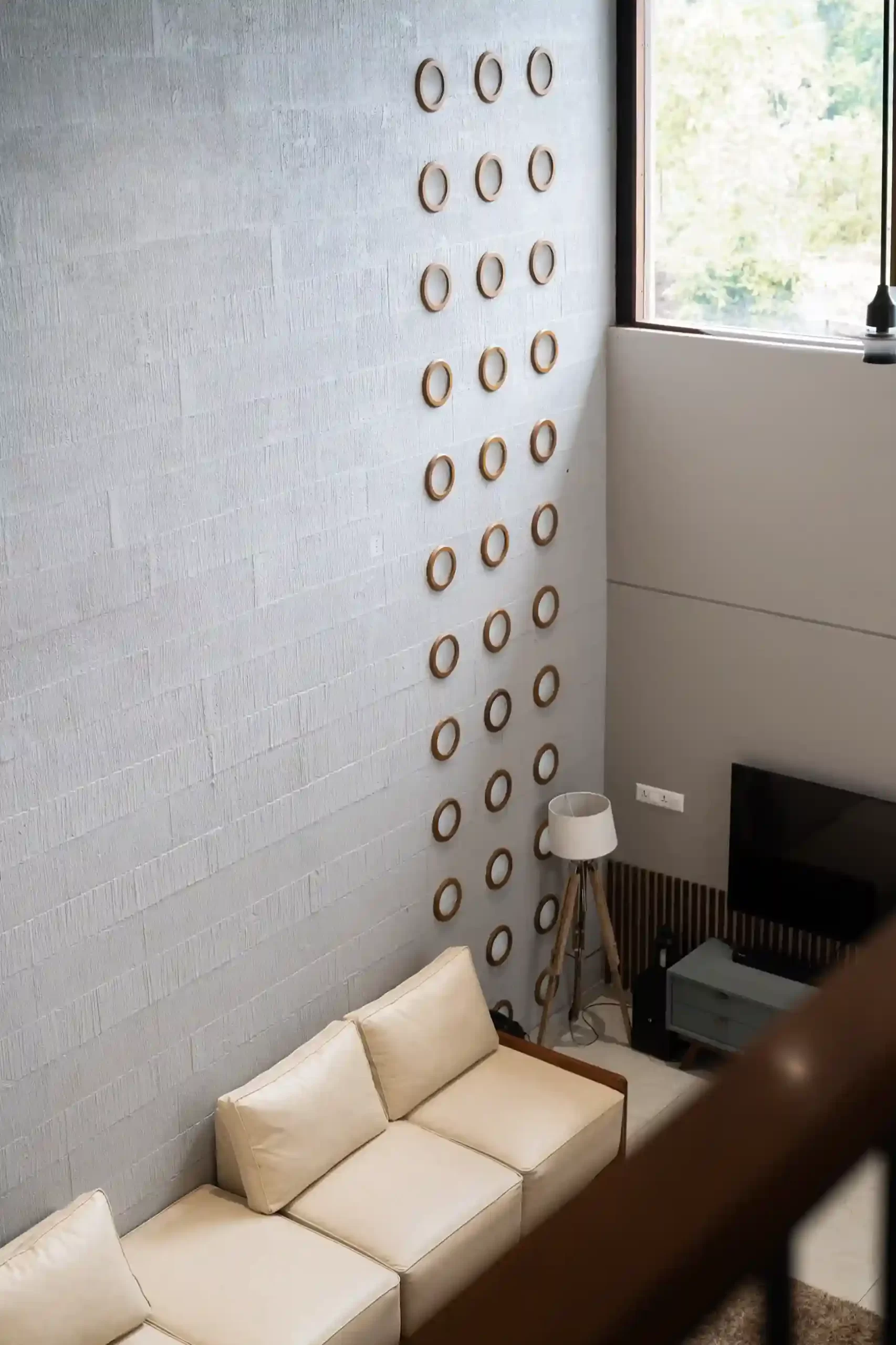 tropical-modern-kerala-living-area-double-height-wall.